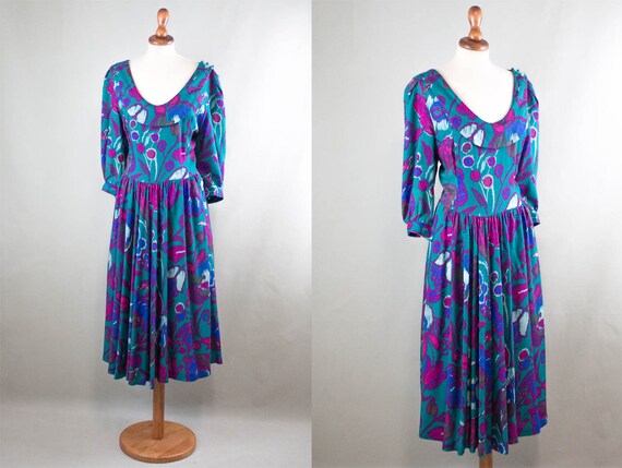 green and shocking pink dresses