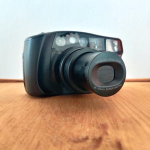 WORKING Samsung af zoom 1050, 35mm point and shoot.
