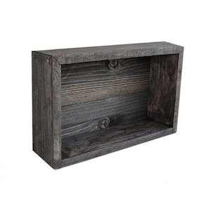 May include: A dark gray wooden box with a rectangular opening. The box is made of reclaimed wood and has a rustic look.