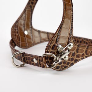 Quick release snap hook detail, embossed brown leather dog harness