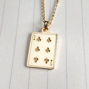 Six of Clubs-ketting, Three of Clubs-ketting, Five of Hearts-ketting, Diamonds Ace-ketting, Jack of Diamonds-ketting, King of Hearts-cadeau