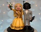 Belle and Bounty Hunter Wedding Cake Topper Figurine