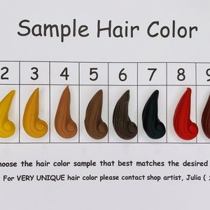May include: A chart with ten hair color samples numbered 1 through 10. The samples are arranged in a row from lightest to darkest. The colors are: light blonde, blonde, light brown, medium brown, dark brown, black, red, auburn, and red. The text on the chart reads: "Sample Hair Color" and "Please choose the hair color sample that best matches the desired hair color. For VERY UNIQUE hair color please contact shop artist, Julia (";).