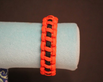 Reflective Orange Enwrapped Black Paracord Bracelet