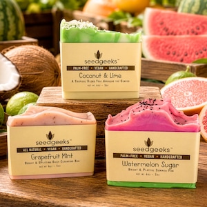 May include: Three rectangular bars of handcrafted soap labeled Coconut & Lime, Grapefruit Mint, and Watermelon Sugar. Each bar features a tan paper wrapper with the seedgeeks logo, text, and a net weight of 4oz - 5oz, topped with textured soap.