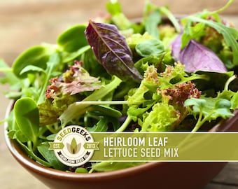 May include: A brown bowl filled with a fresh Heirloom Leaf Lettuce Seed Mix. The mix includes various green and purple lettuce leaves. The Seed Geeks logo is visible. The text "Heirloom Leaf Lettuce Seed Mix" is displayed.