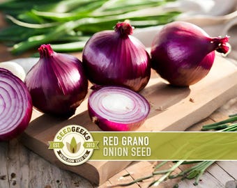 May include: Several whole and sliced red onions on a wooden board. The onions are a vibrant purple with white centres. Green spring onions and the text "Red Grano Onion Seed" are also visible.
