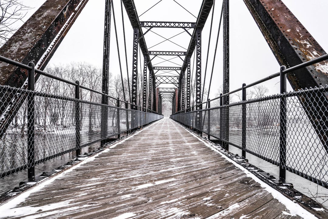 Snow Covered Historic Railroad Bridge Over the Grand River Portland, MI