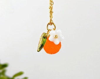 Collier pendentif fruit orange en verre transparent pour femme