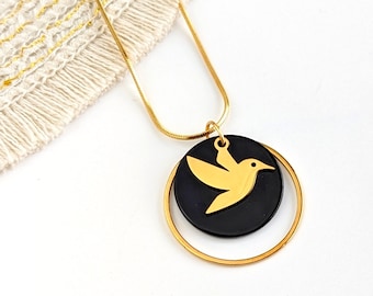 Collier noir et or pendentif colibri pour femme