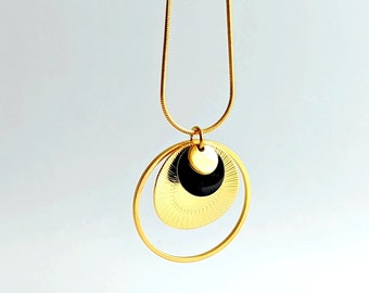 Collier pendentif noir et or bohème chic pour femme