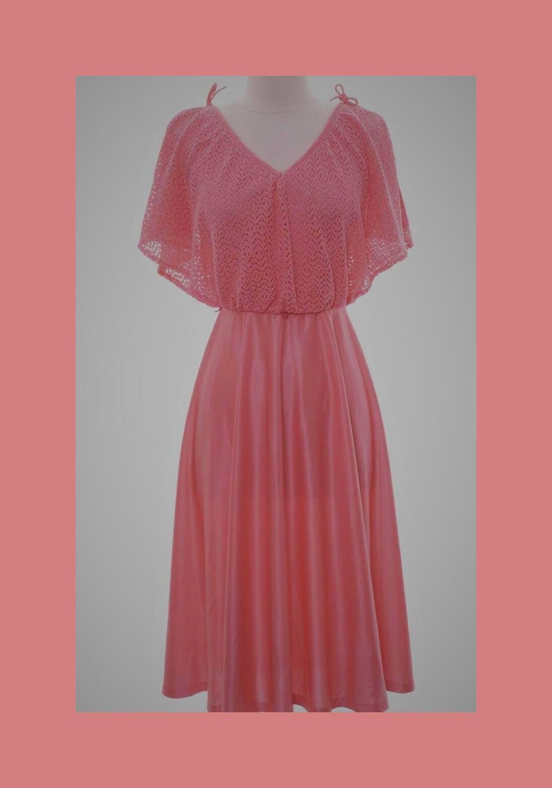 Vintage 1970s disco dress flutter sleeves swingy skirt and ties at shoulder a soft knit sensation with a lacy bodice Vintage size 910