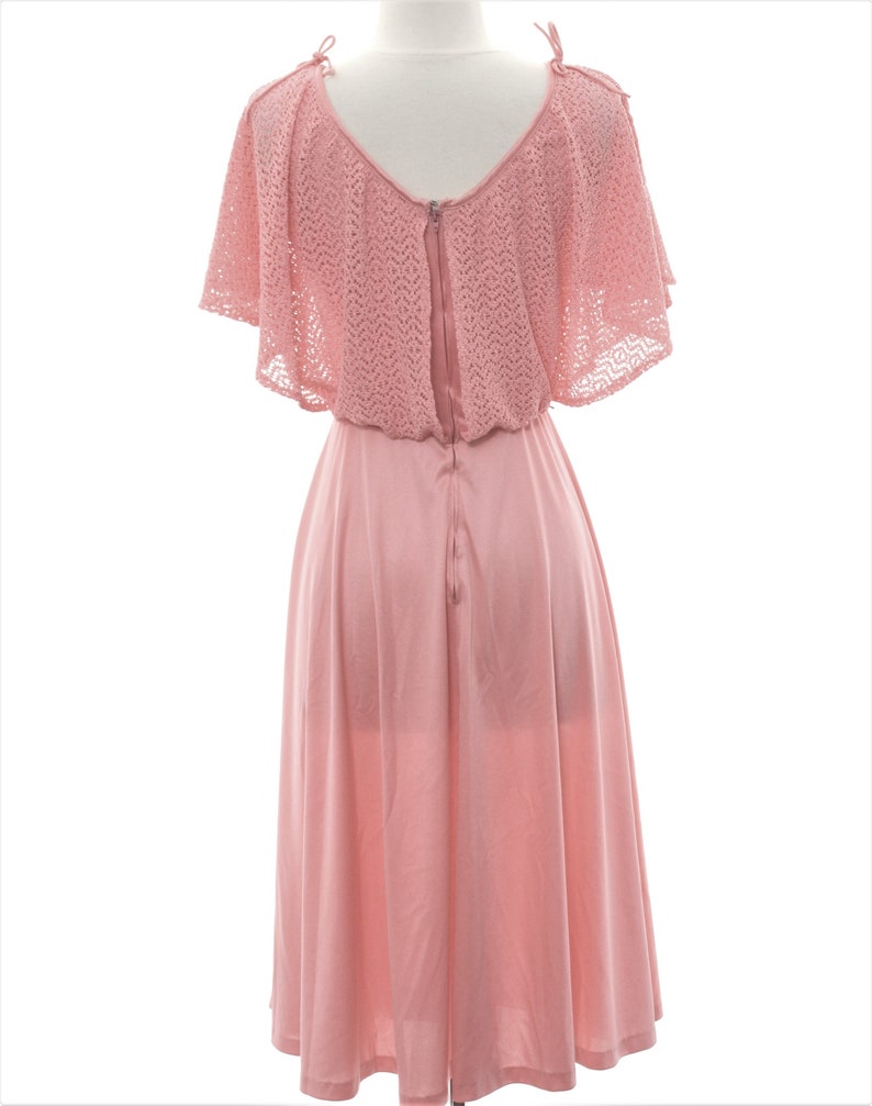 Vintage 1970s disco dress flutter sleeves swingy skirt and ties at shoulder a soft knit sensation with a lacy bodice Vintage size 910