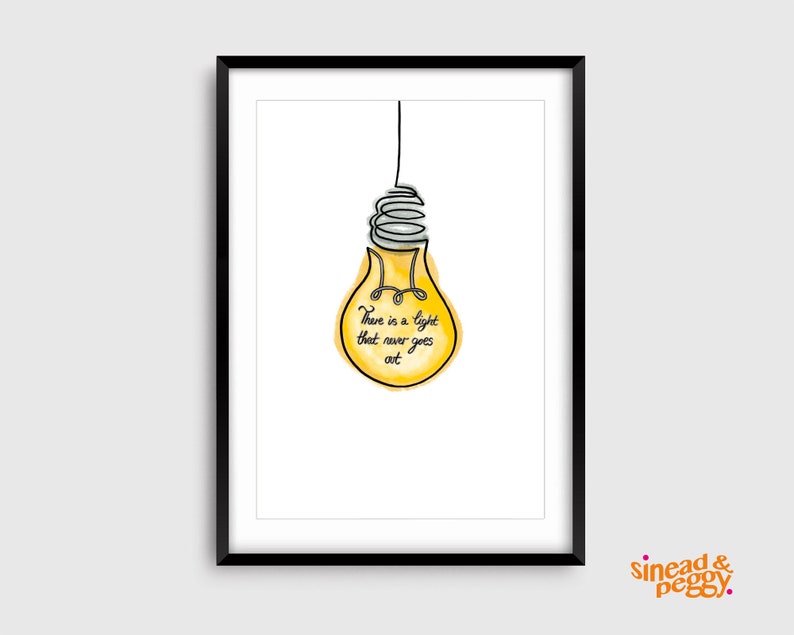 May include: A black framed print with a yellow lightbulb illustration and the text "There is a light that never goes out".