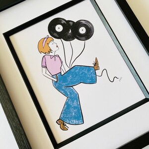 May include: A framed illustration of a woman wearing blue bell bottoms and a pink shirt, holding two black vinyl records as balloons. The woman has short, blonde hair and is smiling. The illustration is signed "Mellie".