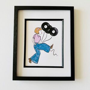 May include: A framed illustration of a woman wearing blue jeans and a pink shirt, holding three black vinyl records as balloons.