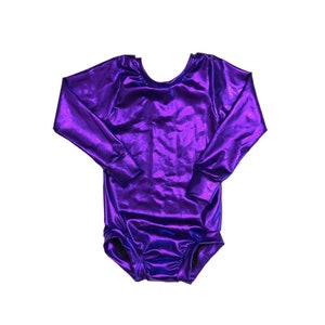May include: A long-sleeved leotard in a vibrant purple iridescent fabric. The leotard has a scoop neck and a fitted silhouette.