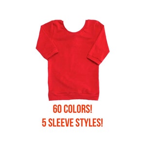May include: Red long-sleeved shirt with a scoop neck. 60 COLORS! 5 SLEEVE STYLES!
