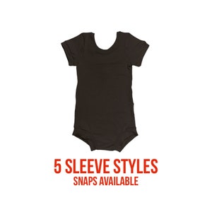 May include: A black short-sleeved bodysuit with a scoop neck. 5 Sleeve Styles Snaps Available.