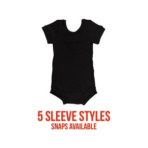 May include: Black short-sleeve bodysuit with a round neckline. 5 Sleeve Styles Snaps Available.