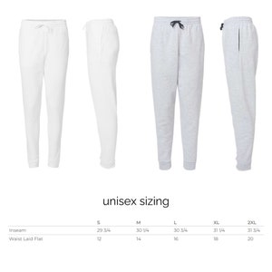 May include: Unisex sweatpants in white and gray with a drawstring waistband. Size chart shows inseam and waist measurements in inches.