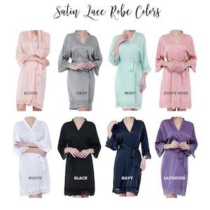May include: Eight satin robes with lace trim in various colors: blush, grey, mint, dusty rose, white, black, navy, and lavender.  Satin Lace Robe Colors.