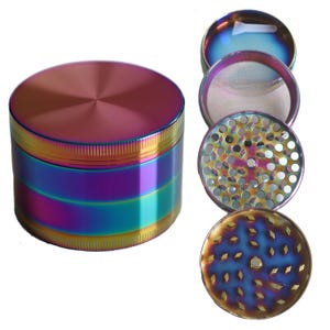 May include: A four-piece iridescent metal grinder with a rainbow finish. The grinder has a top lid, a grinding chamber, a screen, and a collection chamber.