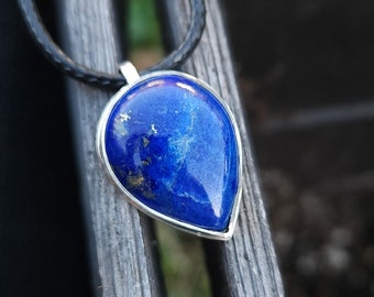 lapis lazuli necklace. 925 sterling silver. 19in black cord.