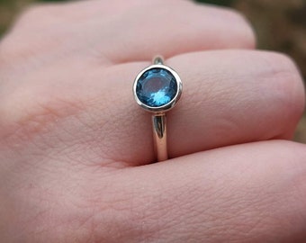 Blue topaz ring. Sterling silver. Size 8.75