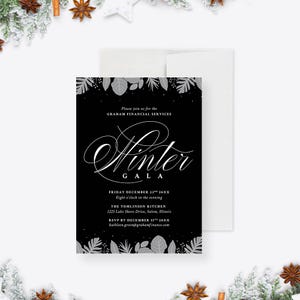 May include: Black and white Winter Gala invitation with text. The invitation includes the text "Please join us for the GRAHAM FINANCIAL SERVICES Winter GALA". The invitation is surrounded by white leaves and winter decorations.