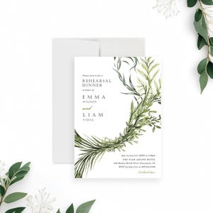May include: A white wedding rehearsal dinner invitation with green foliage and the text "Please join us for a Rehearsal Dinner in honor of Emma Wilson and Liam Vidal. July twenty first 20XX at 6:00pm THE FLOR GRAND HOTEL 638 Shadow Brook Drive Clearwater, FL RSVP by July first at 589.236.21458 Cocktail attire"