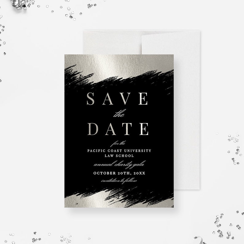May include: Black and silver save the date card with a brushstroke design. The text reads "Save the Date" for the Pacific Coast University Law School annual charity gala on October 20th, 20XX.