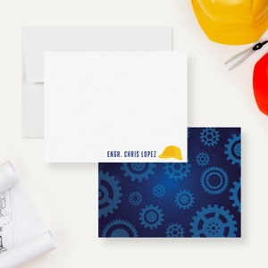 May include: A blue and white stationery set with a yellow hard hat and the text "ENGR. CHRIS LOPEZ". The background features a pattern of blue gears on a dark blue background.