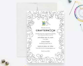 May include: A white invitation with black and blue text for a crafting party called "Crafternoon". The invitation includes the date, time, location, and RSVP information. The invitation is decorated with a black and white illustration of a needle and thread.