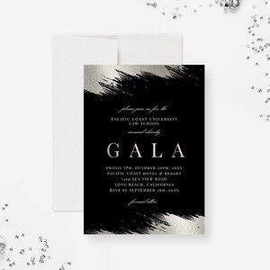 May include: Black and silver invitation with a brushstroke design. The text reads "Please join us for the Pacific Coast University Law School annual charity Gala. Friday 7PM, October 20th, 20XX. Pacific Coast Hotel & Resort, 1310 Sea View Road, Long Beach, California. RSVP by September 3rd, 20XX. Formal attire."