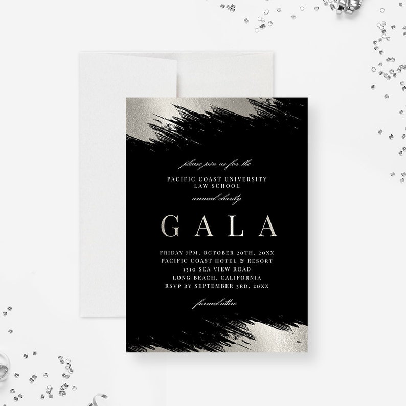 May include: Black and silver invitation with a brushstroke design. The text reads "Please join us for the Pacific Coast University Law School annual charity Gala. Friday 7PM, October 20th, 20XX. Pacific Coast Hotel & Resort, 1310 Sea View Road, Long Beach, California. RSVP by September 3rd, 20XX. Formal attire."