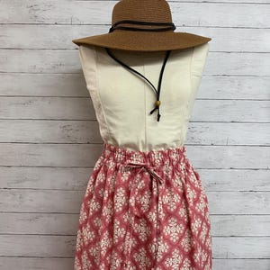 Market skirt using Moda quality cotton fabric.  Rose Pink with white flowers. gathered skirt.  Pink quality cotton skirt. Made in the USA