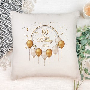 Cojín personalizado para 80 cumpleaños con globos dorados