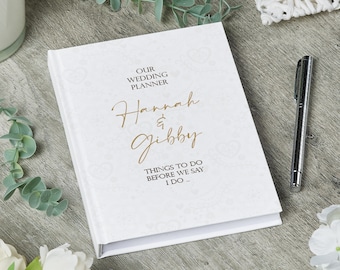 Libro organizador personalizado para bodas y compromisos con delicadas ilustraciones