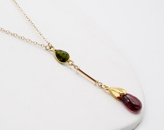 14k gold Y necklace with dark pink tourmaline + olive green tourmaline Trending now