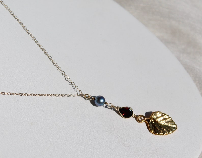 14K gold chain necklace with vermeil vintage gold leaf design and bright red garnet gem