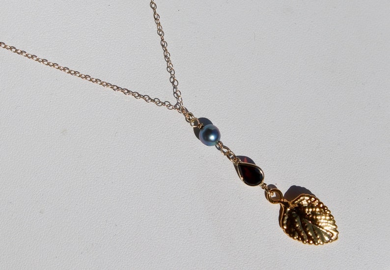 14K gold chain necklace with vermeil vintage gold leaf design and bright red garnet gem