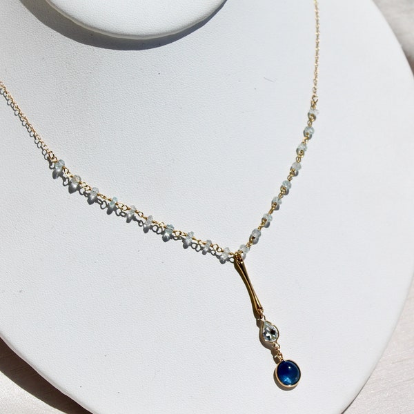 Gold filled necklace with pale blue aquamarine chain and beautiful blue sapphire cabochon