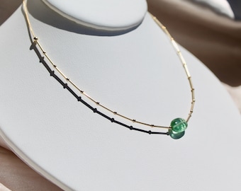 14k gold Modernist necklace with beautiful natural light green tourmaline Trending now