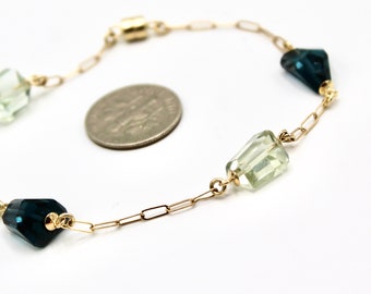 14k paperclip chain bracelet with pale green amethysts and teal blue London topaz gems