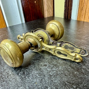 Brass Knob Set with Ornate Plates