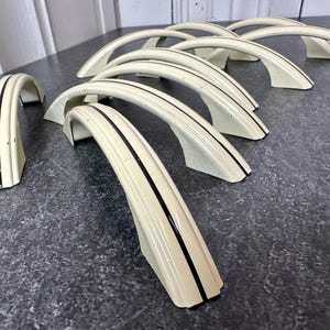 May include: A rustic wooden sign with the text "Welcome" in a handwritten style. The sign is painted white with a distressed finish, and features a simple, elegant design. Perfect for a front door or entryway.