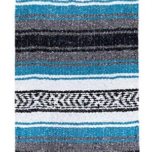 May include: A striped Mexican blanket with a white, black, and turquoise color scheme. The blanket has a fringe border.
