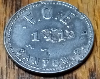 F. O. E. 141 カントン、オハイオ州。5セント相当のトレードトークン、アルミ製、破損したダイとカッド
