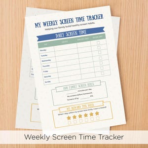 May include: Two sheets of paper with a weekly screen time tracker design. The top sheet has a blue banner with the text "MY WEEKLY SCREEN TIME TRACKER" and a section for daily screen time. The bottom sheet is partially visible.